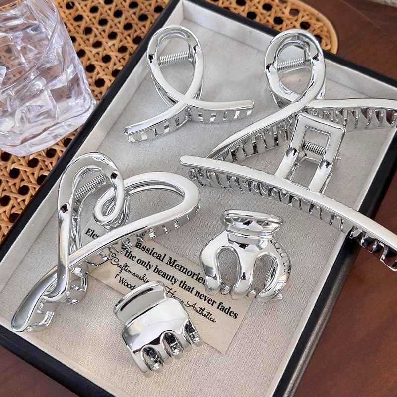 Hi Tech Accessories - Elegante silberne Haarspange aus Metallimitat für